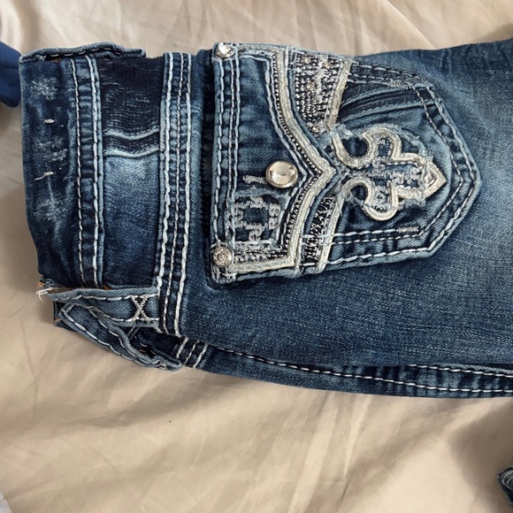 Rock Revival Blue Boot Cut Jeans with Embellished Pockets